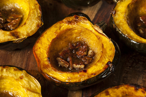 Baked Acorn Squash With Butter Olive Oil and Maple Syrup
