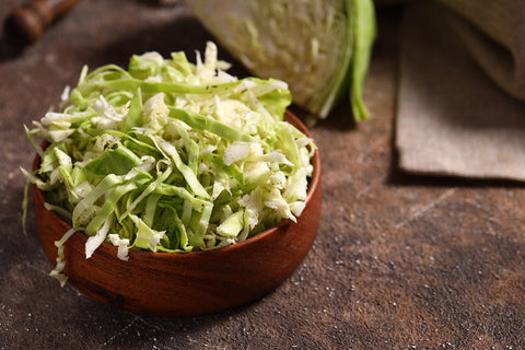 Shaved Brussles Sprouts with EVOO, Lemon Olive Oil & Parmesan Cheese